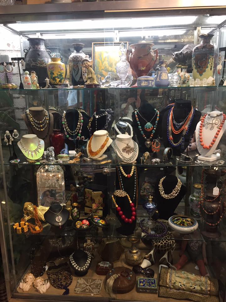 Display with jewelry and other antiques