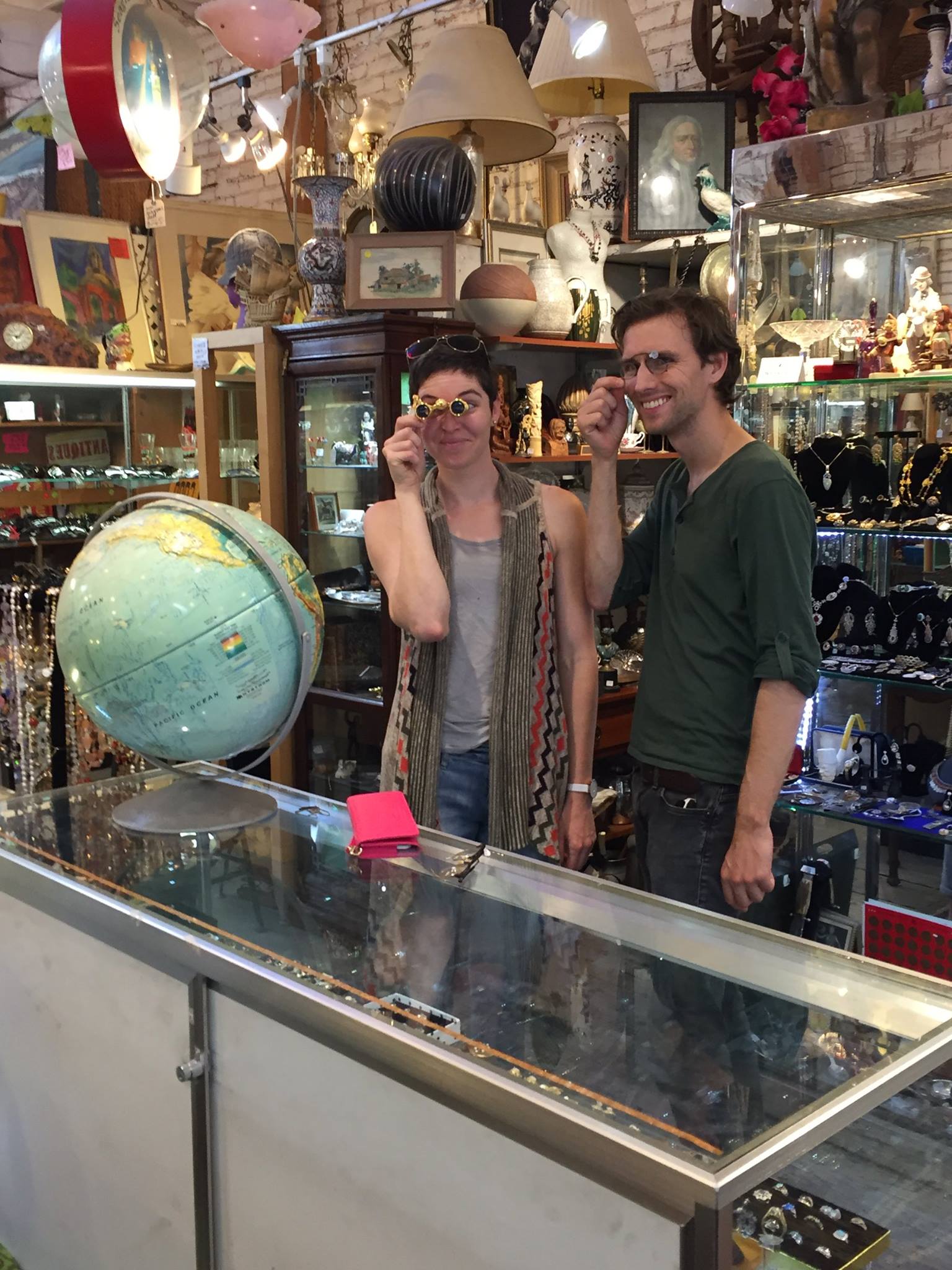 Couple trying on a pair of spectacles