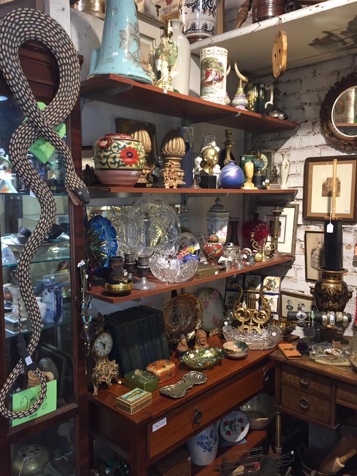 Shelves with various antique items
