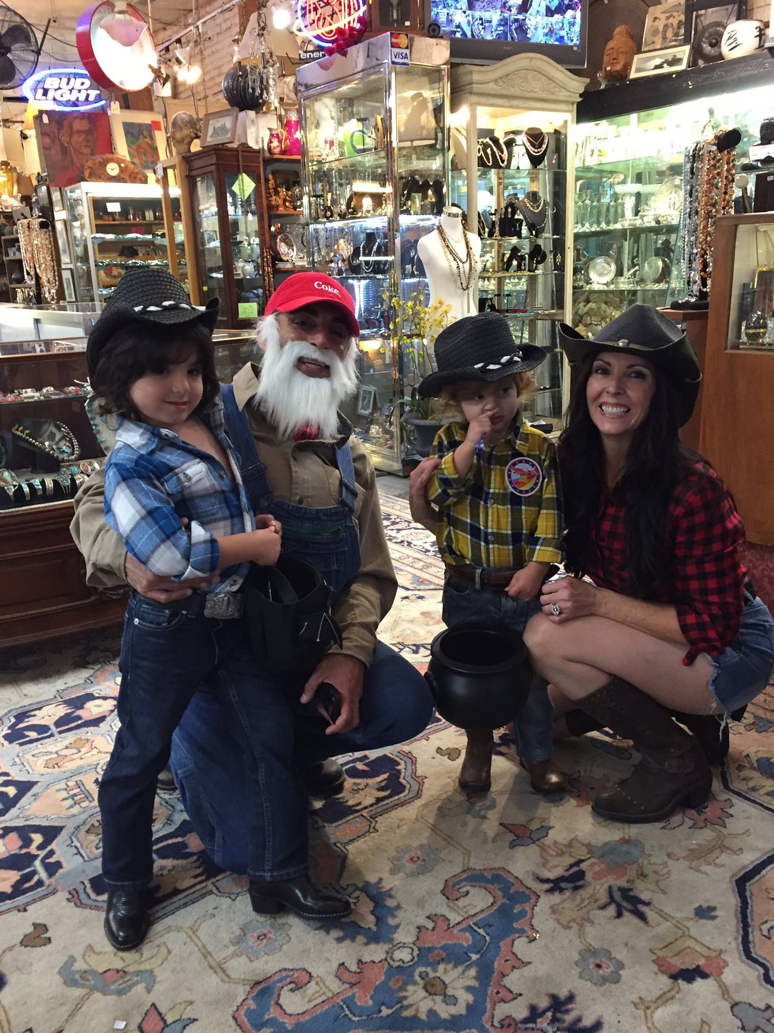 Family of customers dressed up in costume in the store